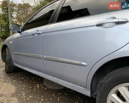 Сірий Кіа Черато, об'ємом двигуна 2 л та пробігом 199 тис. км за 5099 $, фото 12 на Automoto.ua