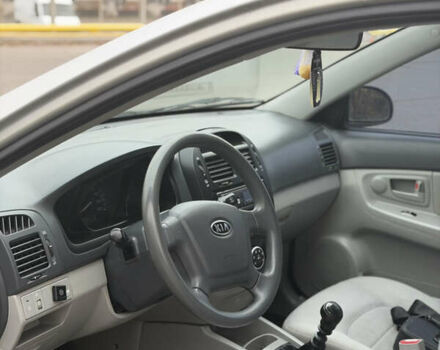 Серый Киа Черато, объемом двигателя 1.59 л и пробегом 196 тыс. км за 4950 $, фото 7 на Automoto.ua