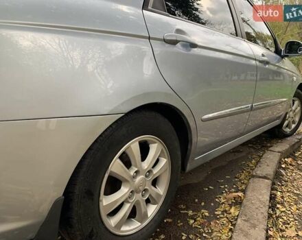 Сірий Кіа Черато, об'ємом двигуна 2 л та пробігом 199 тис. км за 5099 $, фото 11 на Automoto.ua