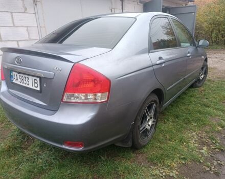 Серый Киа Черато, объемом двигателя 2 л и пробегом 237 тыс. км за 3000 $, фото 5 на Automoto.ua