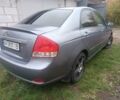 Серый Киа Черато, объемом двигателя 2 л и пробегом 237 тыс. км за 3000 $, фото 5 на Automoto.ua