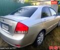 Серый Киа Черато, объемом двигателя 2 л и пробегом 262 тыс. км за 3799 $, фото 1 на Automoto.ua