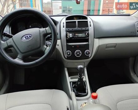 Серый Киа Черато, объемом двигателя 1.59 л и пробегом 170 тыс. км за 5200 $, фото 10 на Automoto.ua