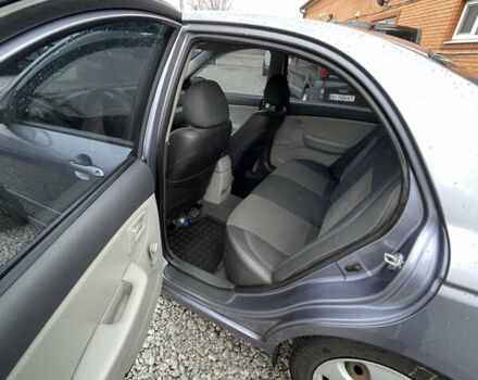 Серый Киа Черато, объемом двигателя 1.59 л и пробегом 144 тыс. км за 4700 $, фото 6 на Automoto.ua