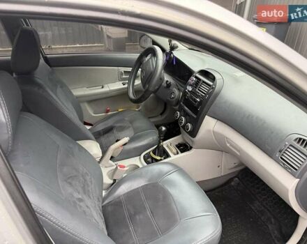 Серый Киа Черато, объемом двигателя 1.59 л и пробегом 205 тыс. км за 4600 $, фото 5 на Automoto.ua