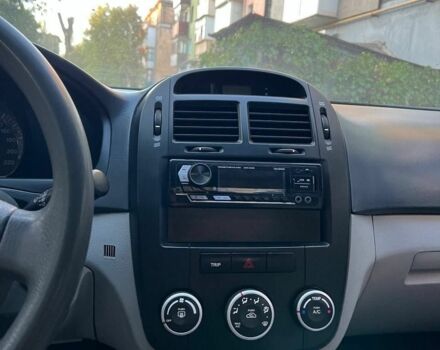 Серый Киа Черато, объемом двигателя 1.6 л и пробегом 1000 тыс. км за 4999 $, фото 7 на Automoto.ua