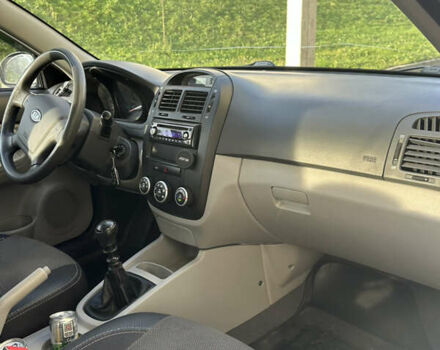 Серый Киа Черато, объемом двигателя 1.6 л и пробегом 140 тыс. км за 4500 $, фото 10 на Automoto.ua