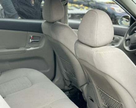 Серый Киа Черато, объемом двигателя 1.58 л и пробегом 495 тыс. км за 3900 $, фото 11 на Automoto.ua