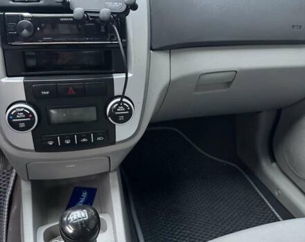 Серый Киа Черато, объемом двигателя 1.6 л и пробегом 181 тыс. км за 4200 $, фото 4 на Automoto.ua