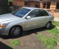 Серый Киа Черато, объемом двигателя 2 л и пробегом 138 тыс. км за 6100 $, фото 1 на Automoto.ua