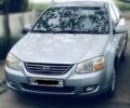 Серый Киа Черато, объемом двигателя 2 л и пробегом 224 тыс. км за 5300 $, фото 1 на Automoto.ua