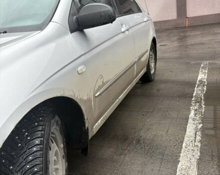 Серый Киа Черато, объемом двигателя 1.6 л и пробегом 194 тыс. км за 4200 $, фото 2 на Automoto.ua