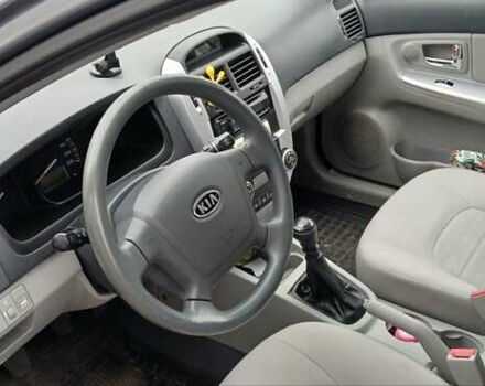 Серый Киа Черато, объемом двигателя 1.6 л и пробегом 158 тыс. км за 4500 $, фото 4 на Automoto.ua