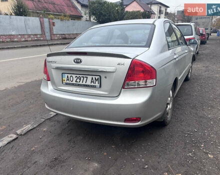 Серый Киа Черато, объемом двигателя 2 л и пробегом 160 тыс. км за 4500 $, фото 2 на Automoto.ua