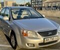 Серый Киа Черато, объемом двигателя 2 л и пробегом 217 тыс. км за 3200 $, фото 1 на Automoto.ua