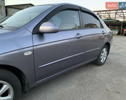 Серый Киа Черато, объемом двигателя 2 л и пробегом 175 тыс. км за 4800 $, фото 7 на Automoto.ua