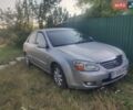 Серый Киа Черато, объемом двигателя 2 л и пробегом 263 тыс. км за 2999 $, фото 1 на Automoto.ua