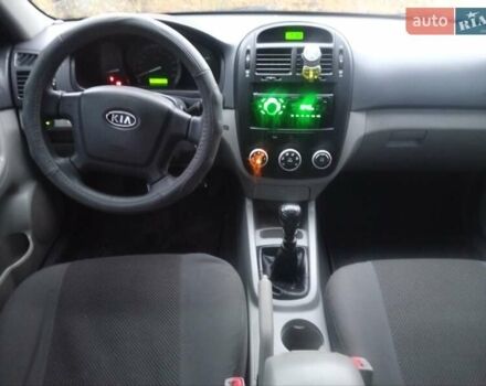 Серый Киа Черато, объемом двигателя 1.6 л и пробегом 220 тыс. км за 3000 $, фото 5 на Automoto.ua