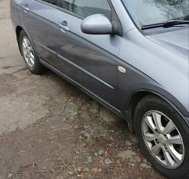 Серый Киа Черато, объемом двигателя 1.6 л и пробегом 158 тыс. км за 4500 $, фото 2 на Automoto.ua