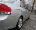 Серый Киа Черато, объемом двигателя 2 л и пробегом 190 тыс. км за 4200 $, фото 1 на Automoto.ua