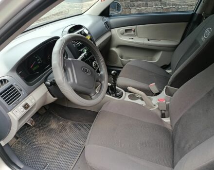 Сірий Кіа Черато, об'ємом двигуна 1.6 л та пробігом 270 тис. км за 3600 $, фото 5 на Automoto.ua
