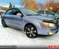 Серый Киа Черато, объемом двигателя 1.6 л и пробегом 280 тыс. км за 3850 $, фото 1 на Automoto.ua