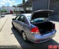 Серый Киа Черато, объемом двигателя 1.6 л и пробегом 205 тыс. км за 4200 $, фото 1 на Automoto.ua