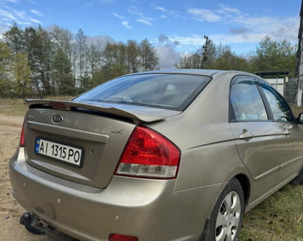 Серый Киа Черато, объемом двигателя 1.6 л и пробегом 280 тыс. км за 5500 $, фото 2 на Automoto.ua