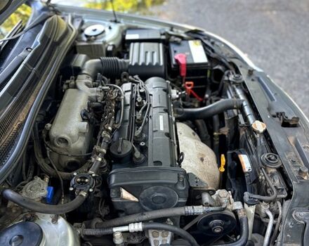 Серый Киа Черато, объемом двигателя 2 л и пробегом 215 тыс. км за 4950 $, фото 9 на Automoto.ua