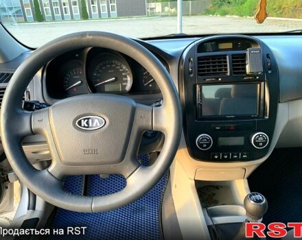 Серый Киа Черато, объемом двигателя 2 л и пробегом 225 тыс. км за 4800 $, фото 6 на Automoto.ua