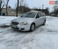 Серый Киа Черато, объемом двигателя 1.59 л и пробегом 250 тыс. км за 2799 $, фото 1 на Automoto.ua