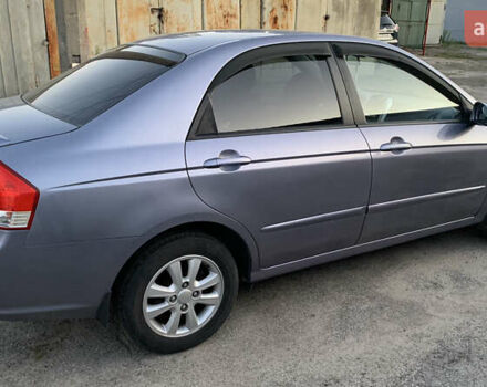 Серый Киа Черато, объемом двигателя 2 л и пробегом 175 тыс. км за 4800 $, фото 3 на Automoto.ua