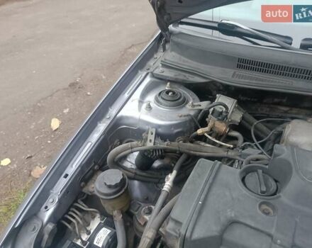 Серый Киа Черато, объемом двигателя 1.98 л и пробегом 230 тыс. км за 3000 $, фото 1 на Automoto.ua