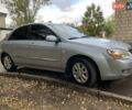 Сірий Кіа Черато, об'ємом двигуна 2 л та пробігом 199 тис. км за 5099 $, фото 1 на Automoto.ua