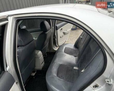 Серый Киа Черато, объемом двигателя 1.59 л и пробегом 205 тыс. км за 4600 $, фото 3 на Automoto.ua