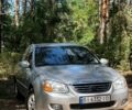 Серый Киа Черато, объемом двигателя 2 л и пробегом 308 тыс. км за 5300 $, фото 1 на Automoto.ua