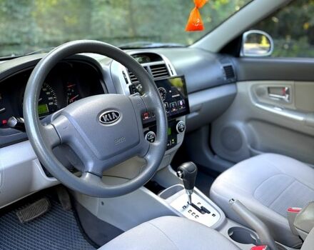 Серый Киа Черато, объемом двигателя 2 л и пробегом 215 тыс. км за 4950 $, фото 5 на Automoto.ua