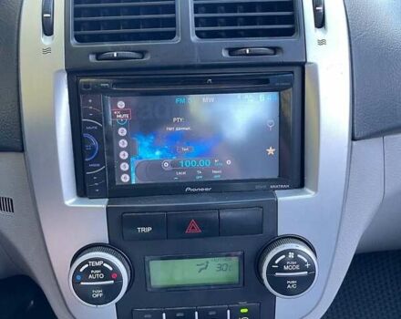 Серый Киа Черато, объемом двигателя 2 л и пробегом 233 тыс. км за 4500 $, фото 12 на Automoto.ua