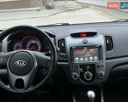 Серый Киа Черато, объемом двигателя 1.6 л и пробегом 188 тыс. км за 6999 $, фото 39 на Automoto.ua