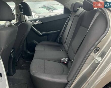 Сірий Кіа Черато, об'ємом двигуна 2 л та пробігом 198 тис. км за 6490 $, фото 9 на Automoto.ua