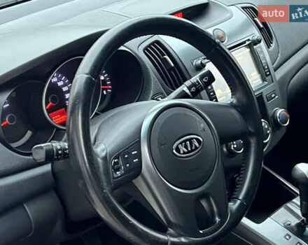 Серый Киа Черато, объемом двигателя 1.6 л и пробегом 188 тыс. км за 6999 $, фото 35 на Automoto.ua