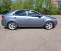Серый Киа Черато, объемом двигателя 2 л и пробегом 185 тыс. км за 6499 $, фото 2 на Automoto.ua