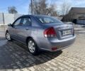 Серый Киа Черато, объемом двигателя 1.6 л и пробегом 202 тыс. км за 4750 $, фото 1 на Automoto.ua