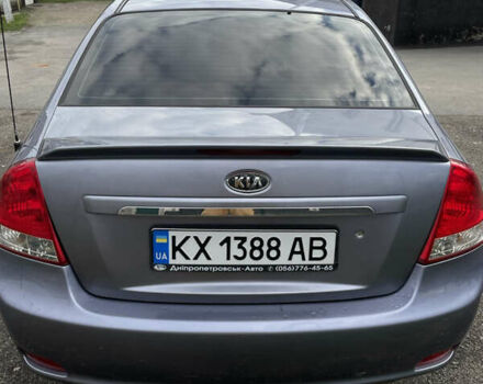 Серый Киа Черато, объемом двигателя 2 л и пробегом 245 тыс. км за 3900 $, фото 3 на Automoto.ua