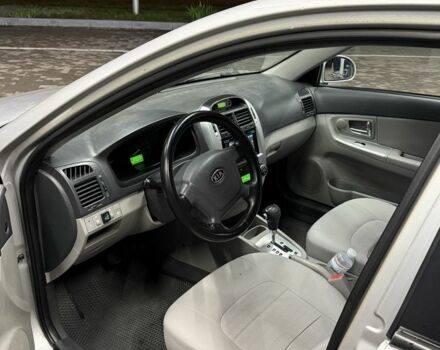 Серый Киа Черато, объемом двигателя 2 л и пробегом 234 тыс. км за 4800 $, фото 3 на Automoto.ua