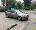 Серый Киа Черато, объемом двигателя 2 л и пробегом 177 тыс. км за 6000 $, фото 2 на Automoto.ua