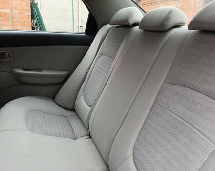 Серый Киа Черато, объемом двигателя 1.6 л и пробегом 200 тыс. км за 4100 $, фото 9 на Automoto.ua