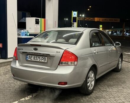 Серый Киа Черато, объемом двигателя 2 л и пробегом 234 тыс. км за 4800 $, фото 1 на Automoto.ua