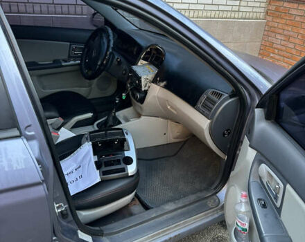 Серый Киа Черато, объемом двигателя 1.98 л и пробегом 246 тыс. км за 3900 $, фото 6 на Automoto.ua