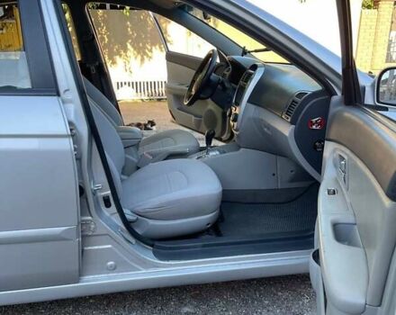 Серый Киа Черато, объемом двигателя 2 л и пробегом 233 тыс. км за 4500 $, фото 5 на Automoto.ua